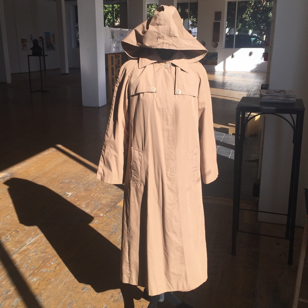 Vintage trench coat with removable hood and liner.